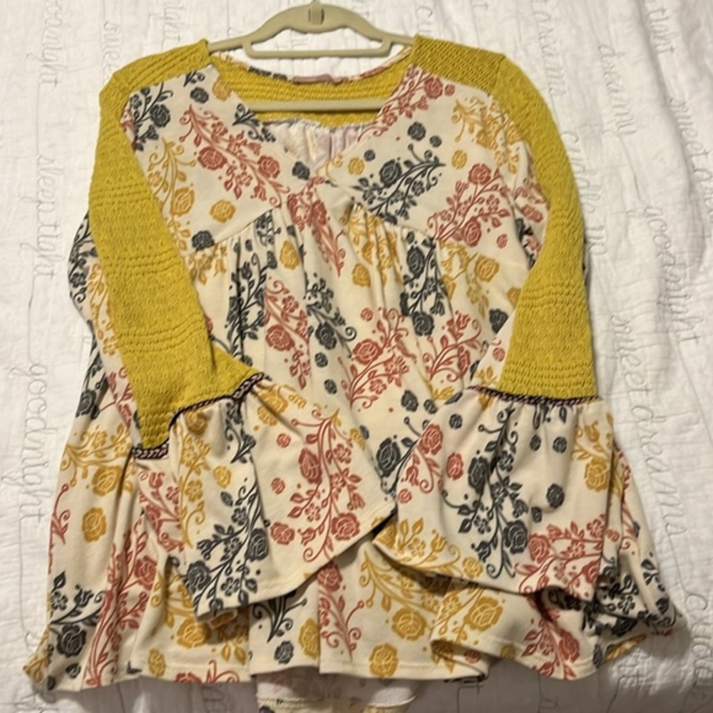 Ces Femme Vintage inspired. Crochet inserts braided trim detail on bell sleeves.